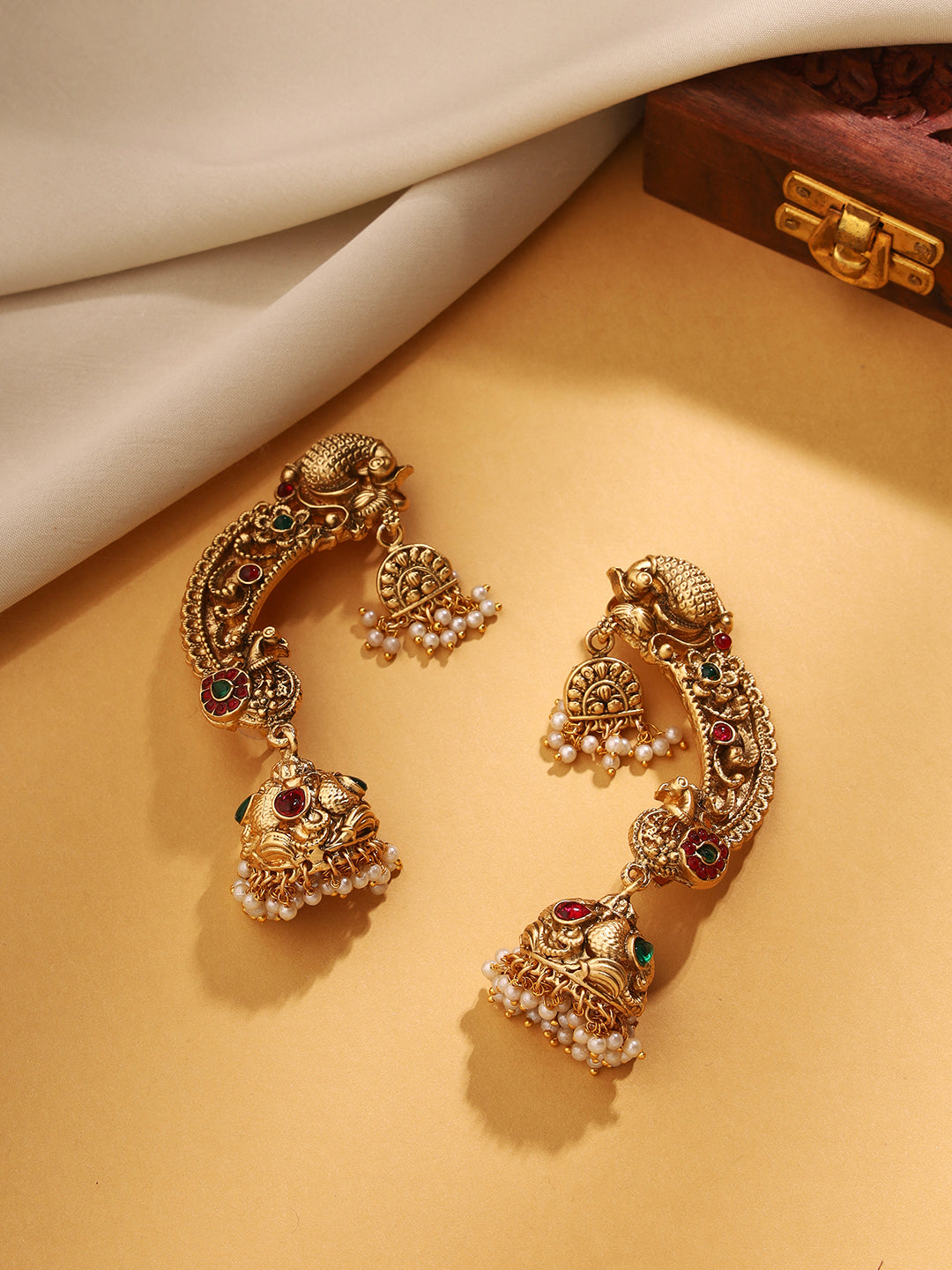 Priyaasi An Intricacies of Bhuta-Inspired Ear Cuffs with Peacock Design