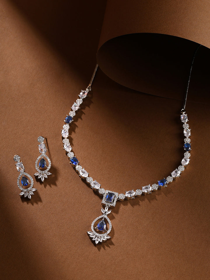 Priyaasi Royal Blue Stone AD Majestic Elegance Silver Plating Necklace with Floral Drop Earrings Jewelery Set