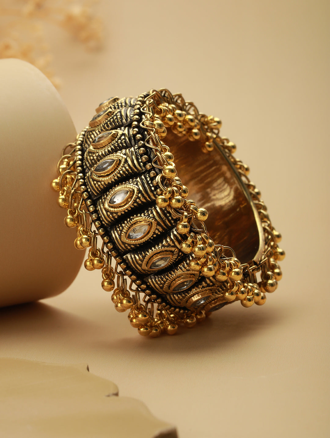 Priyaasi Oxidised Bold Studded Leaf Gold-Plated Ghungroo Bracelet