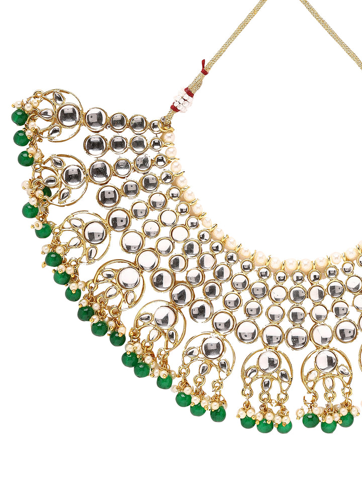 Priyaasi Glimmering Kundan Elegance and Green Stones Jewellery Set with Maangtika