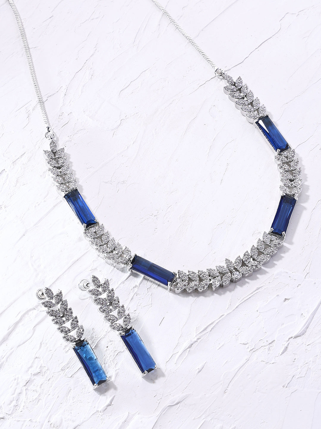 Priyaasi Leaf Royal Blue Stoned AD Chic Silver Plating Necklace with Drop Earrings Jewellery Set