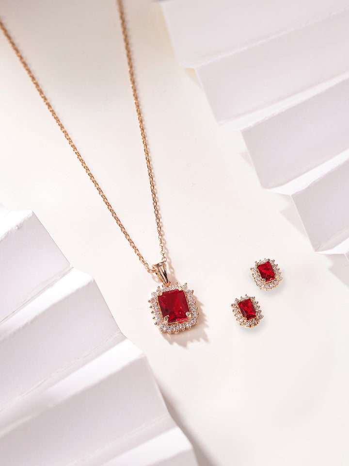 Bright Red Stoned Geometry Rose Gold Plated Pendant with AD Stud Earrings Jewellery Set