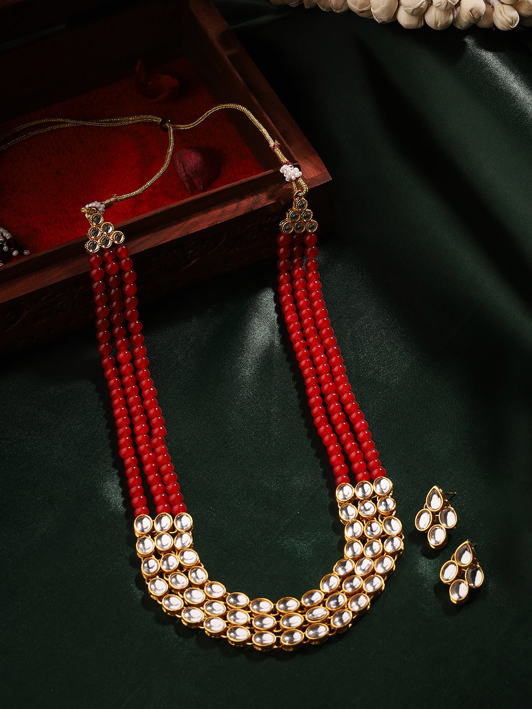 Priyaasi A Kundan Jewellery Set Adorned with Rubies and Exquisite Earrings