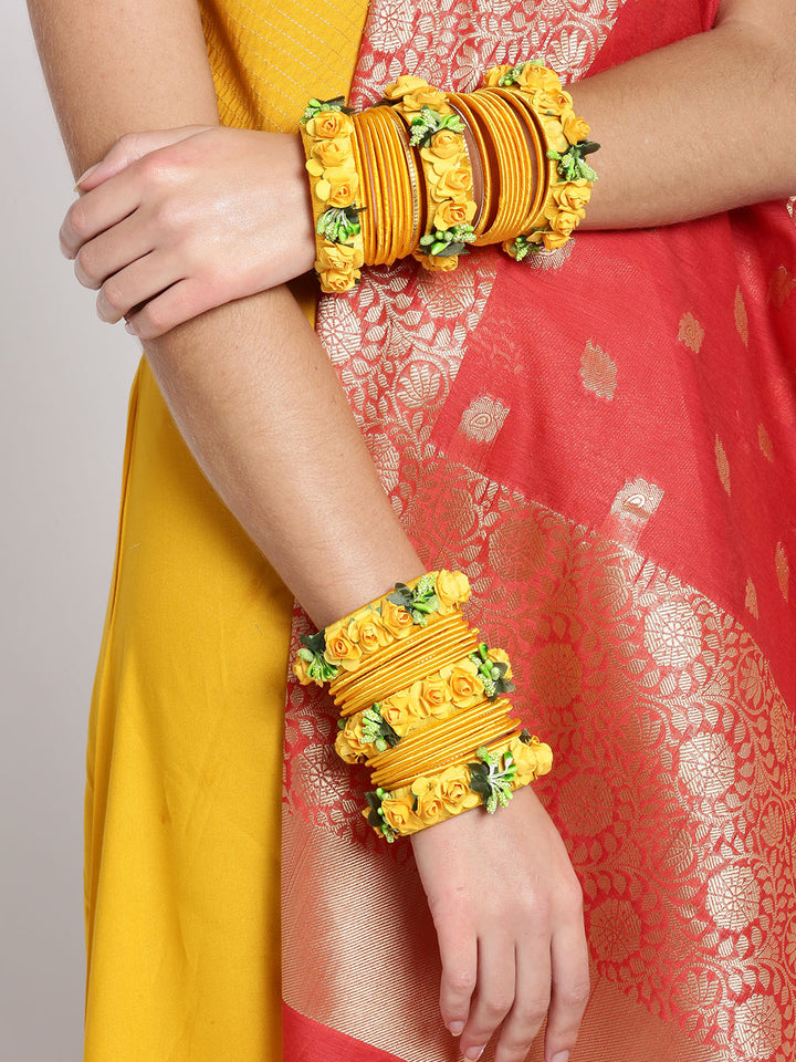 Set Of 46 Floral Design Yellow Colour Silk Thread Wound Bangle Set
