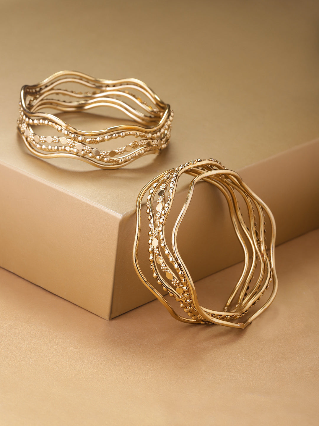 Set Of 10 Gold-Plated Curved Shape Bangles