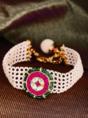 Gold-Plated Pachi Kundan Studded Link Bracelet in White and Magenta Color