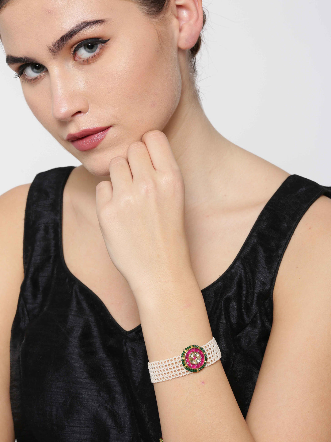 Gold-Plated Pachi Kundan Studded Link Bracelet in White and Magenta Color