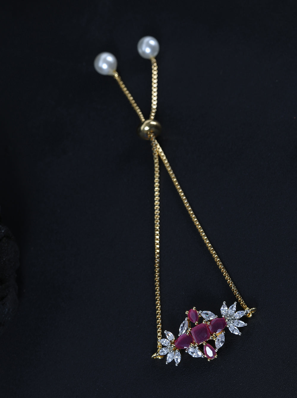 Gold Plated Floral Pattern CZ Magenta Stone Studded Adjustable Charm Bracelet