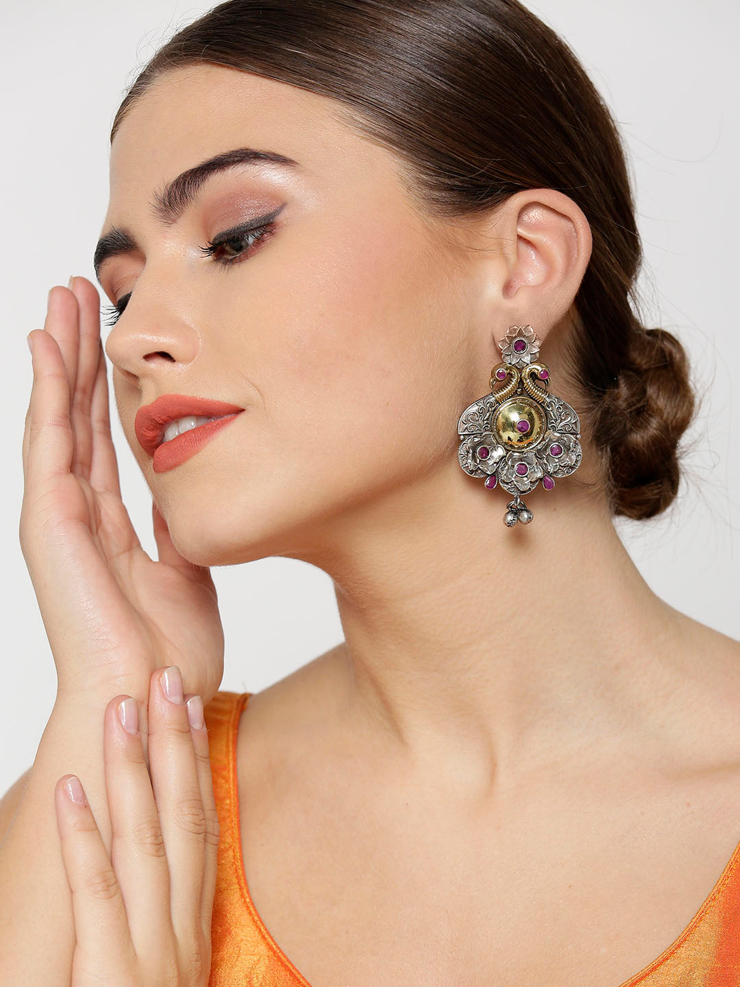 Oxidized Dual-Toned Magenta Stones Studded Peacock Inspired Antique Drop Earrings