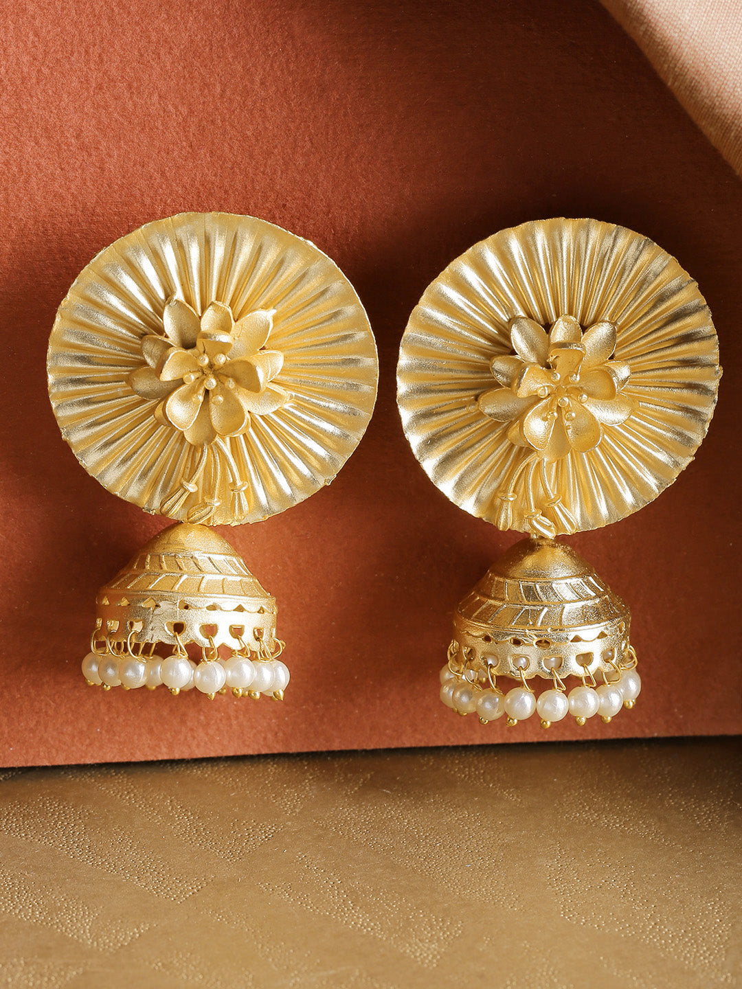 Gold-Plated Floral Patterned Jhumka Earrings with Pearls Drop