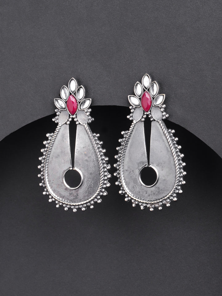 Oxidised Silver-Plated Kundan and Ruby Studded Teardrop Shaped Earrings