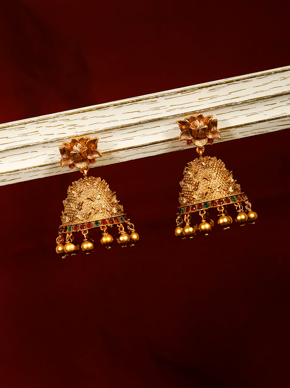 Kemp Stones Studded Gold Plated Butterfly Shaped Jhumka Earrings