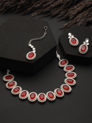 Priyaasi Ruby Oval AD Studded Silver-Plated Jewellery Set with Maangtikka