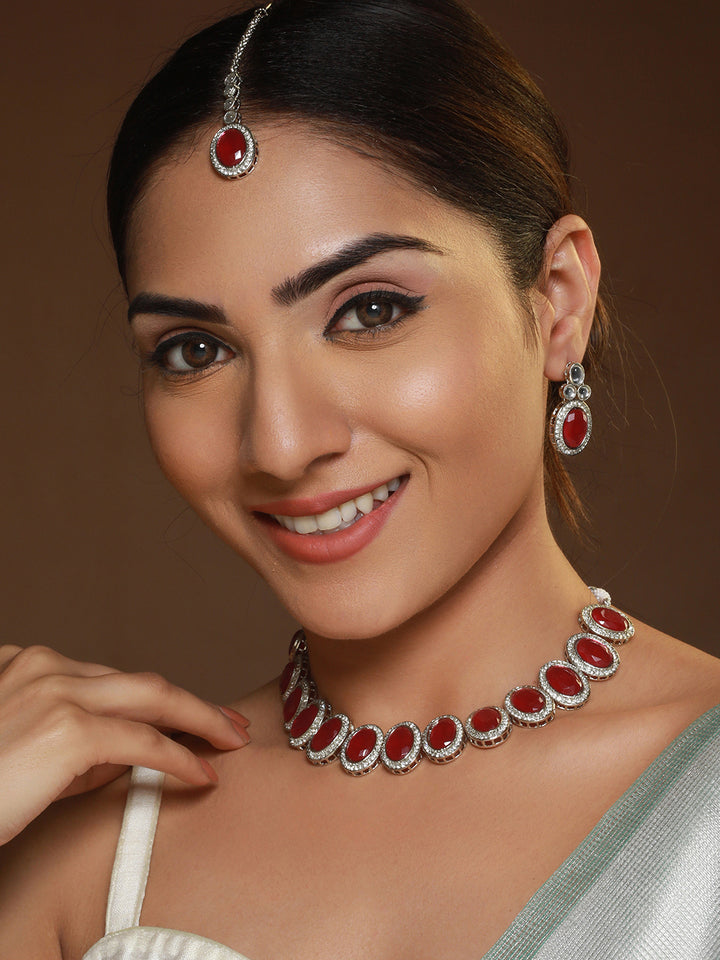 Priyaasi Ruby Oval AD Studded Silver-Plated Jewellery Set with Maangtikka
