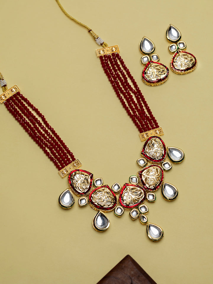 Priyaasi Elegant Kundan Studded Carved Multilayer Gold-Plated Jewellery Set