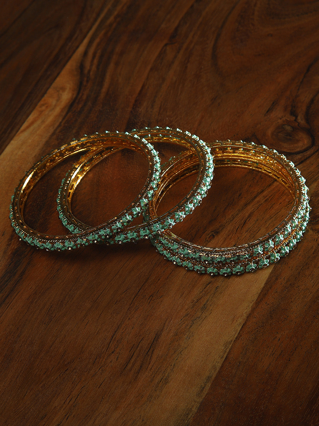 Set Of 4 Gold-Plated Stones Studded Mint Green Meenakari Bangles in Floral Pattern