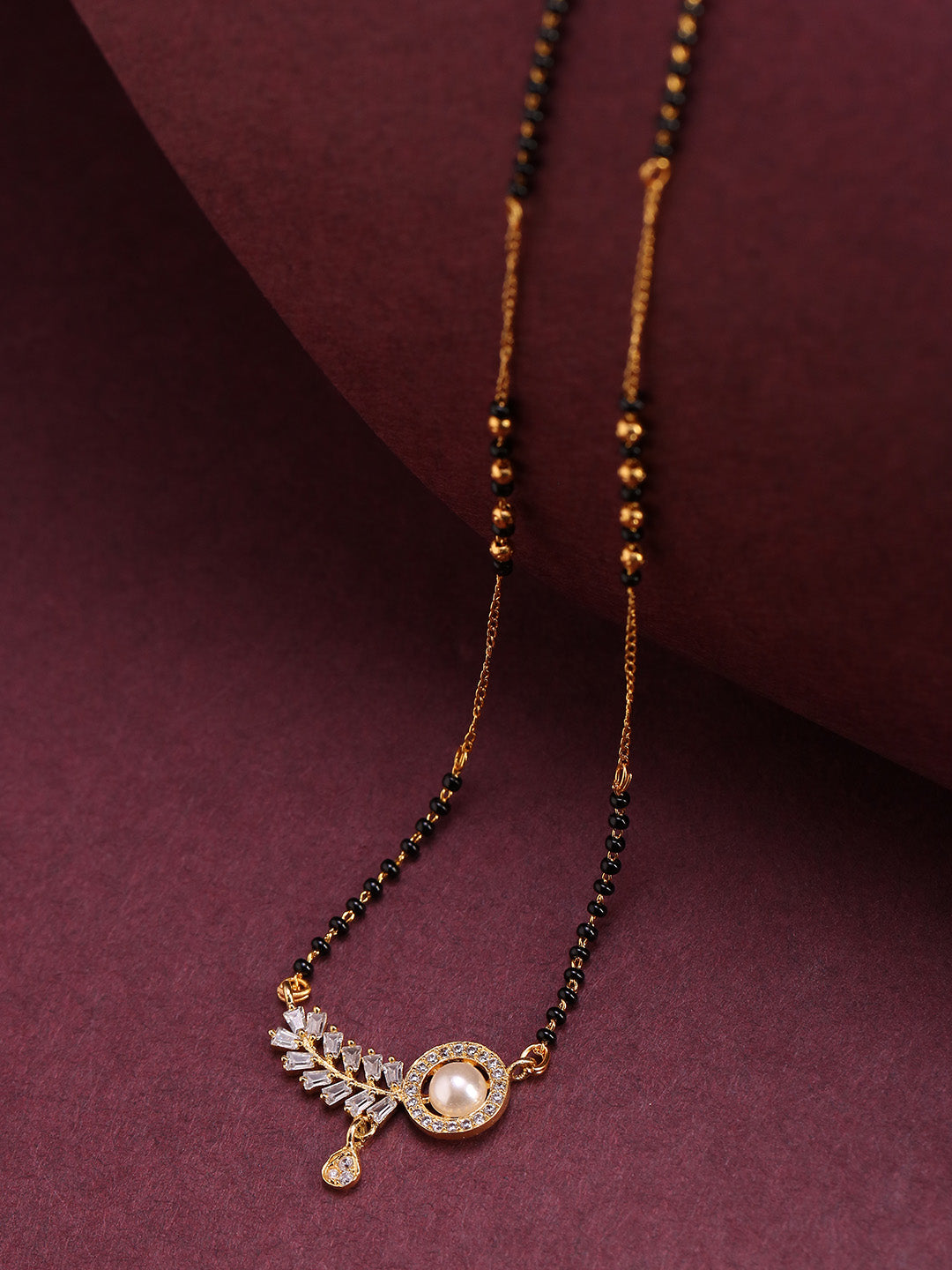 Gold-Plated AD Studded Leaf Design Pendant Black Beaded Chain Mangalsutra